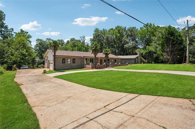12 Windsor Way, Newnan, GA 30263 - ranch-style house with driveway, a front yard, brick siding, and an attached garage