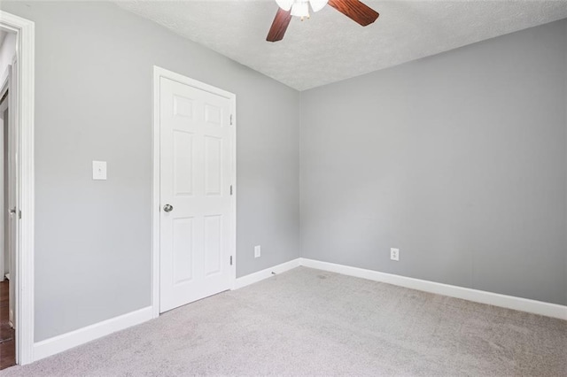 12 Windsor Way, Newnan, GA 30263 - unfurnished bedroom with carpet flooring, a textured ceiling, and a ceiling fan
