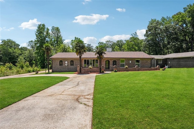 12 Windsor Way, Newnan, GA 30263 - ranch-style house featuring concrete driveway, a front lawn, and brick siding