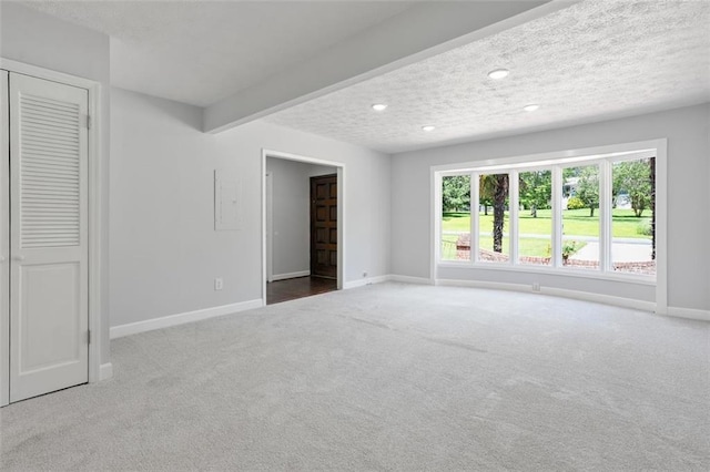 12 Windsor Way, Newnan, GA 30263 - unfurnished bedroom featuring carpet, recessed lighting, a textured ceiling, and a closet
