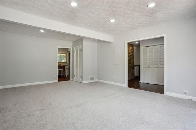 12 Windsor Way, Newnan, GA 30263 - unfurnished bedroom featuring carpet, recessed lighting, and a textured ceiling