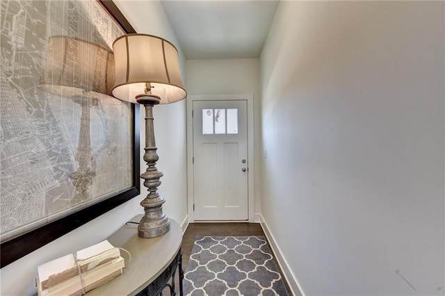 doorway to outside featuring dark hardwood / wood-style flooring