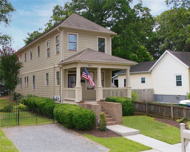 view of front of property with a front lawn and a porch