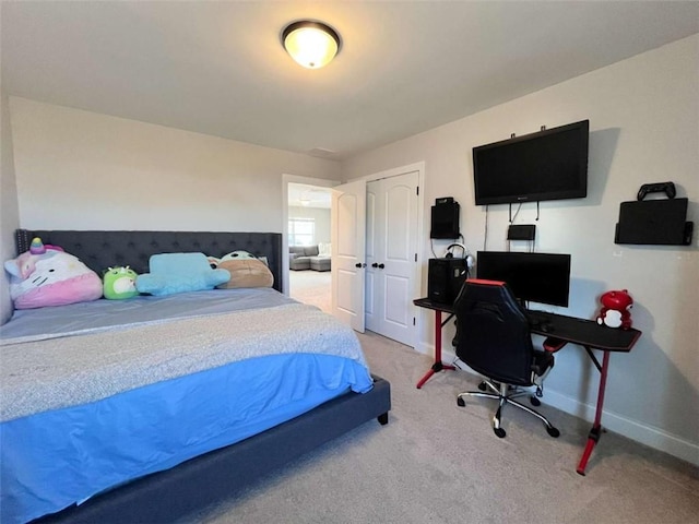 carpeted bedroom featuring a closet