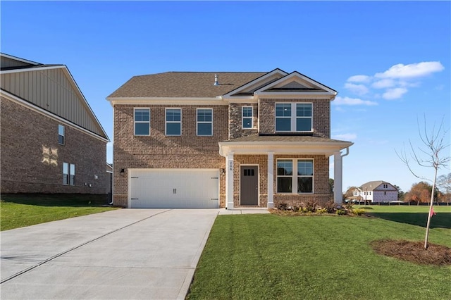 view of front facade featuring a garage and a front yard