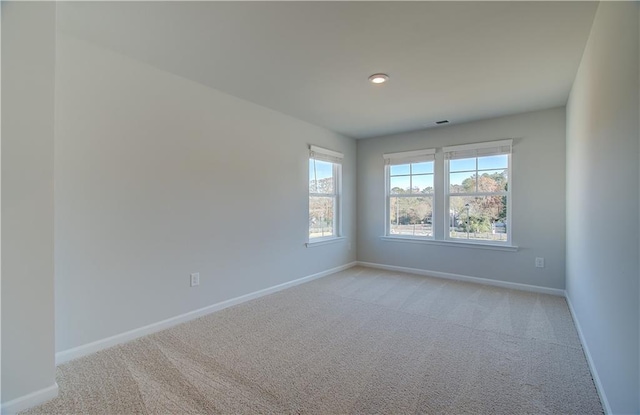 view of carpeted spare room