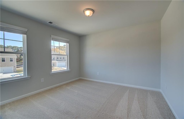 view of carpeted spare room