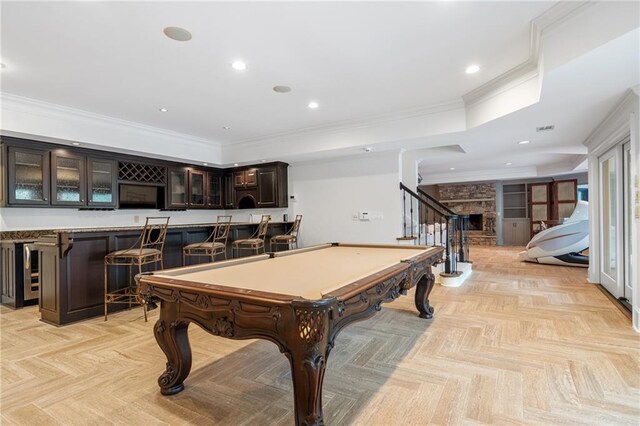 playroom featuring ornamental molding, beverage cooler, indoor bar, and billiards