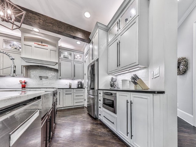 5039 Towne Lake Hls N, Woodstock, GA 30189 - kitchen featuring smart refrigerator, wall oven, crown molding, dark wood-style floors, and tasteful backsplash