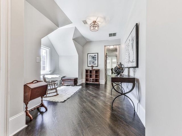 5039 Towne Lake Hls N, Woodstock, GA 30189 - living area featuring wood finished floors, baseboards, and lofted ceiling