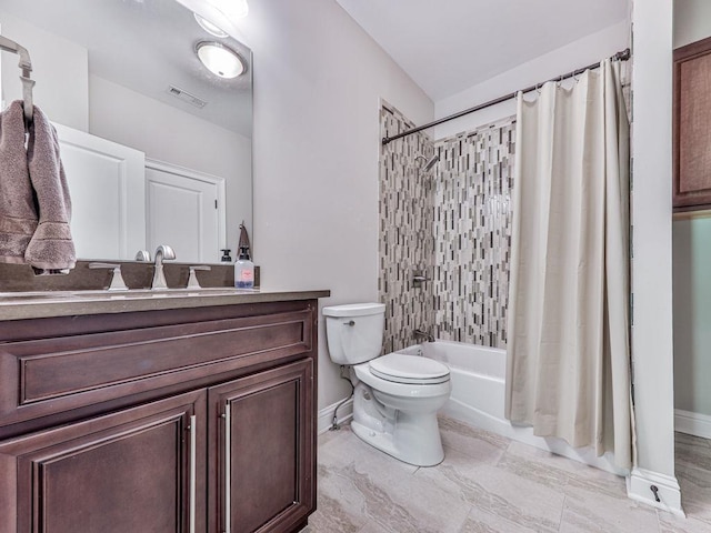 5039 Towne Lake Hls N, Woodstock, GA 30189 - bathroom with shower / tub combo, toilet, baseboards, and vanity