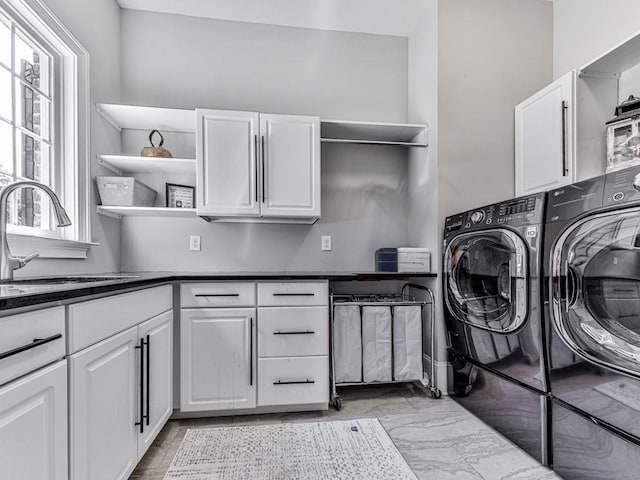 5039 Towne Lake Hls N, Woodstock, GA 30189 - laundry room with cabinet space and separate washer and dryer