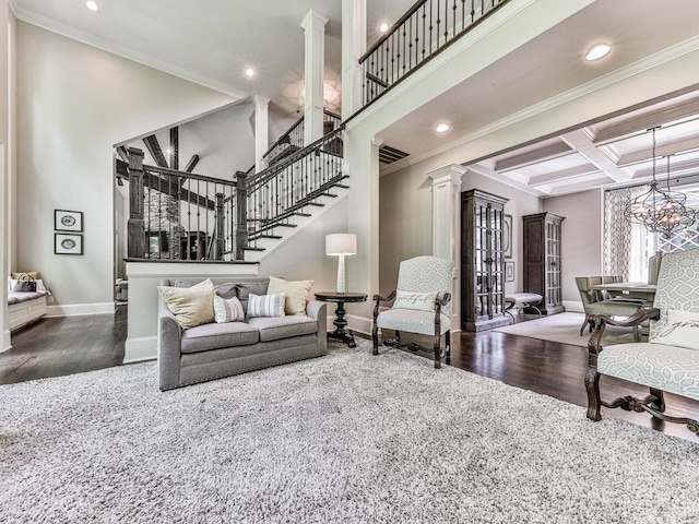 5039 Towne Lake Hls N, Woodstock, GA 30189 - living area featuring baseboards, coffered ceiling, decorative columns, ornamental molding, and recessed lighting