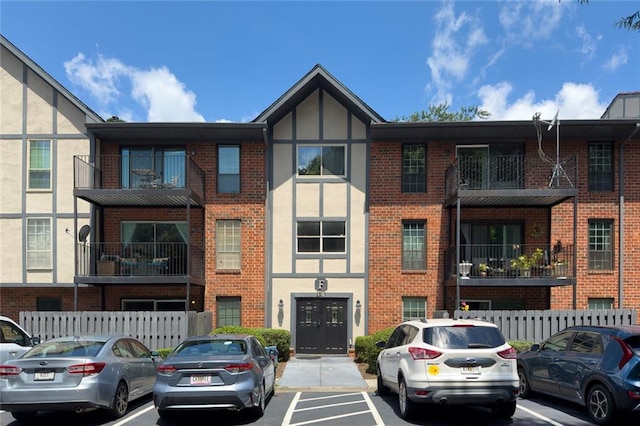6851 Roswell Rd Unit F5, Sandy Springs, GA 30328 - view of property with uncovered parking