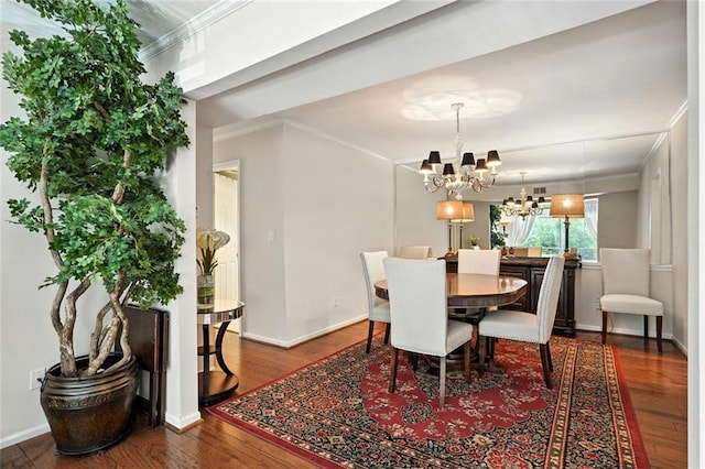 6851 Roswell Rd Unit F5, Sandy Springs, GA 30328 - dining area featuring a chandelier, ornamental molding, and wood finished floors