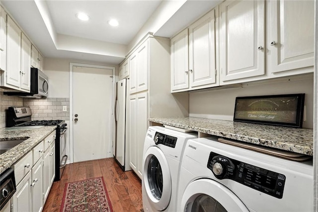 6851 Roswell Rd Unit F5, Sandy Springs, GA 30328 - laundry room with dark wood-type flooring, separate washer and dryer, and recessed lighting
