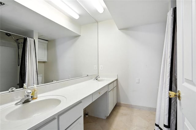 6851 Roswell Rd Unit F5, Sandy Springs, GA 30328 - bathroom featuring double vanity, a shower with curtain, and tile patterned flooring