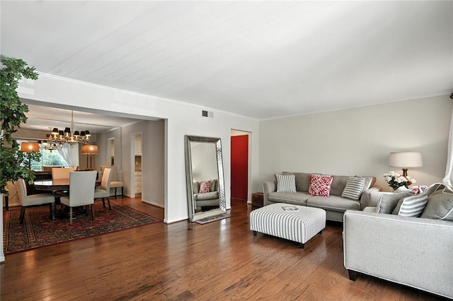 6851 Roswell Rd Unit F5, Sandy Springs, GA 30328 - living area featuring a chandelier, wood finished floors, and crown molding
