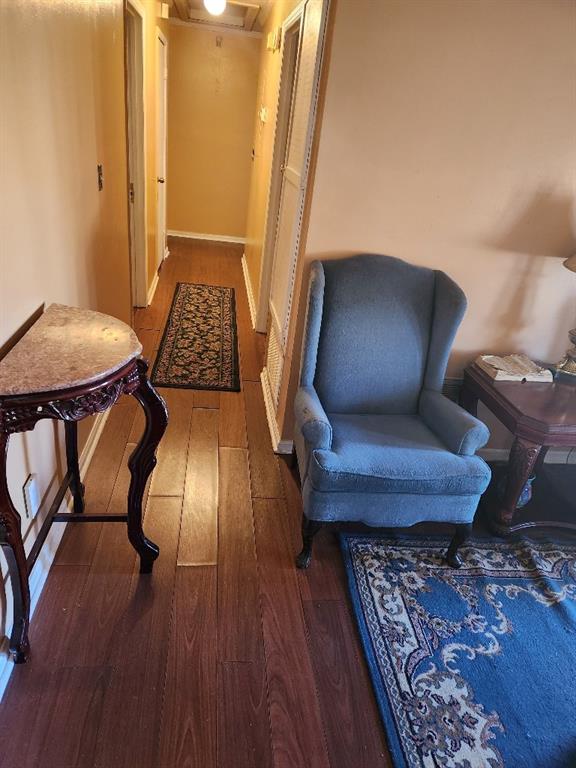 hallway featuring dark hardwood / wood-style flooring