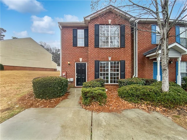 view of front of property featuring brick siding