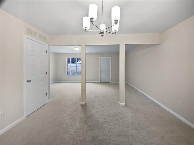 interior space with baseboards and visible vents