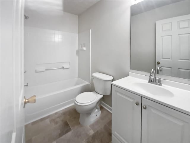 bathroom with toilet, tub / shower combination, and vanity