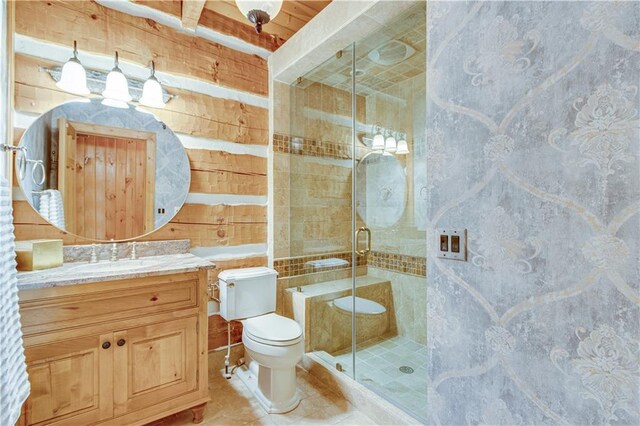 3464 Carolyn St, Gainesville, GA 30504 - bathroom featuring toilet, a stall shower, vanity, tile patterned floors, and wooden walls