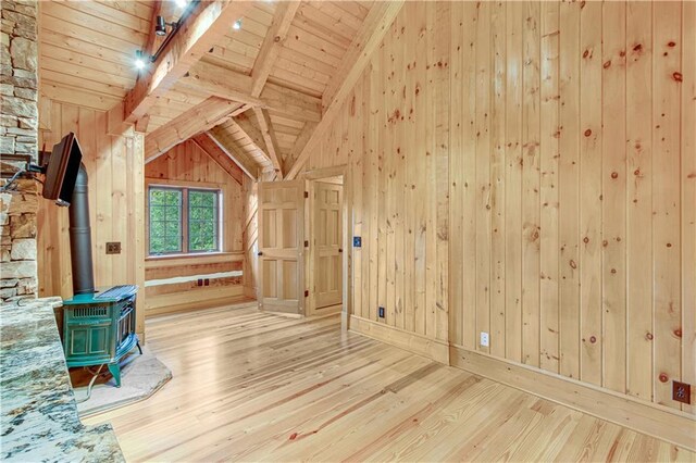 3464 Carolyn St, Gainesville, GA 30504 - bonus room with wooden ceiling, wood finished floors, wood walls, and a wood stove