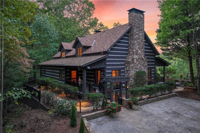 3464 Carolyn St, Gainesville, GA 30504 - view of front facade featuring a chimney and a porch