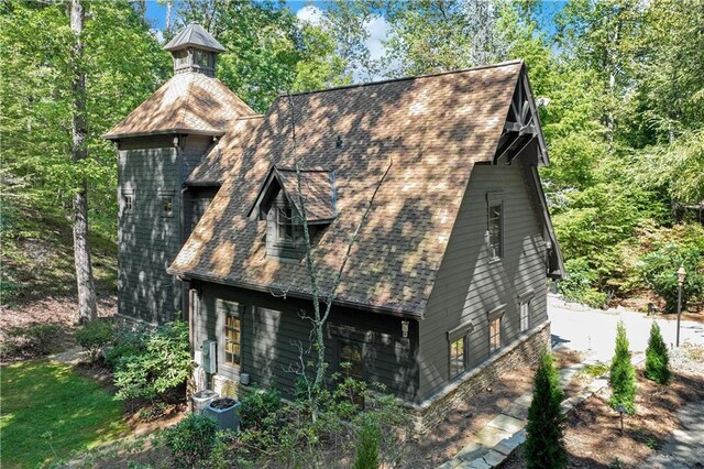 3464 Carolyn St, Gainesville, GA 30504 - view of side of property with a shingled roof