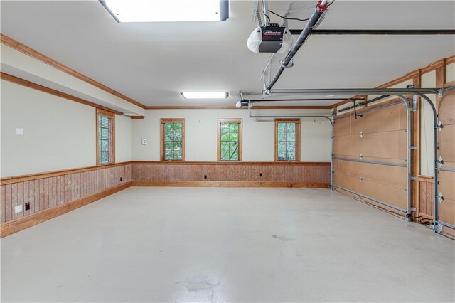3464 Carolyn St, Gainesville, GA 30504 - garage with a garage door opener, a wainscoted wall, and wooden walls