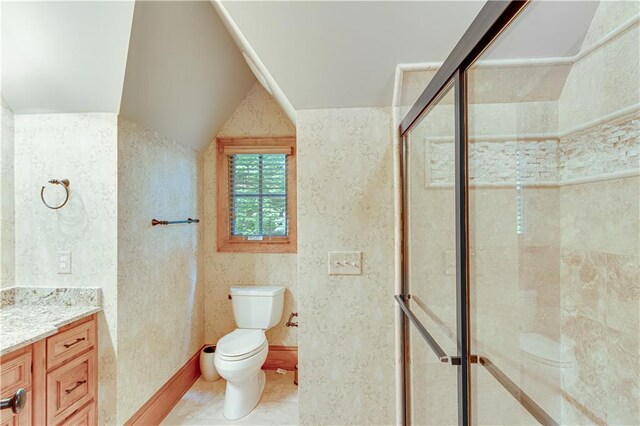 3464 Carolyn St, Gainesville, GA 30504 - bathroom with a shower stall, toilet, vanity, and tile patterned floors