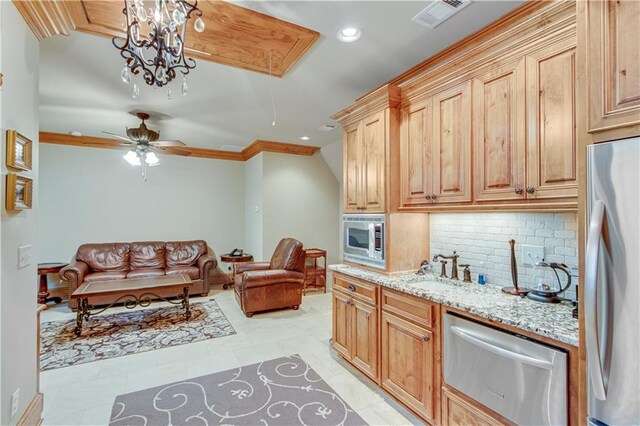 3464 Carolyn St, Gainesville, GA 30504 - kitchen with stainless steel appliances, tasteful backsplash, a sink, light stone countertops, and a ceiling fan