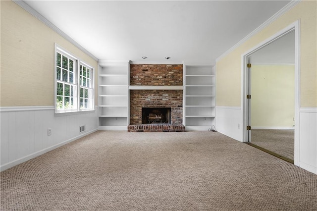 1229 Colony Cir, Marietta, GA 30068 - unfurnished living room featuring ornamental molding, a wainscoted wall, carpet flooring, built in features, and a fireplace