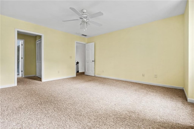 1229 Colony Cir, Marietta, GA 30068 - unfurnished bedroom with carpet floors, a closet, and a ceiling fan