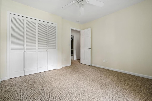 1229 Colony Cir, Marietta, GA 30068 - unfurnished bedroom with carpet floors, a closet, and a ceiling fan