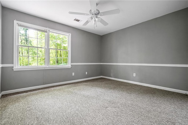 1229 Colony Cir, Marietta, GA 30068 - unfurnished room featuring plenty of natural light, carpet flooring, and ceiling fan