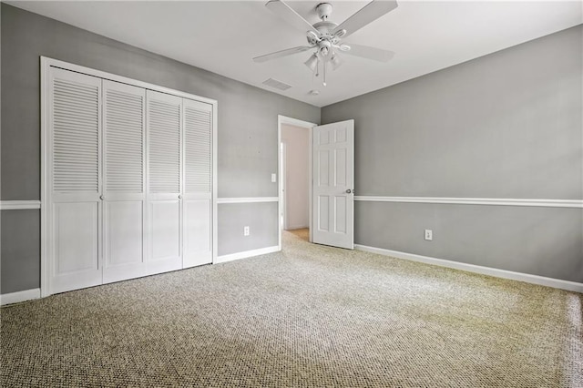 1229 Colony Cir, Marietta, GA 30068 - unfurnished bedroom featuring carpet floors, a closet, and a ceiling fan