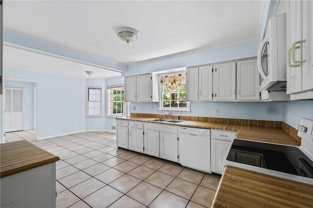 1229 Colony Cir, Marietta, GA 30068 - kitchen with white appliances, light tile patterned flooring, white cabinetry, crown molding, and butcher block countertops