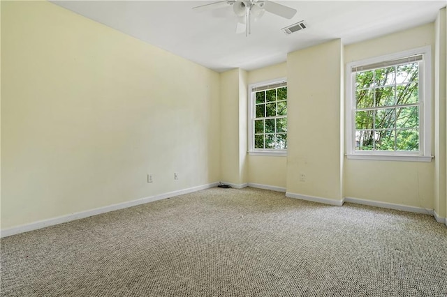 1229 Colony Cir, Marietta, GA 30068 - unfurnished room featuring carpet flooring, healthy amount of natural light, and ceiling fan