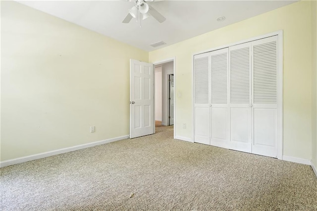 1229 Colony Cir, Marietta, GA 30068 - unfurnished bedroom with carpet, a closet, and ceiling fan