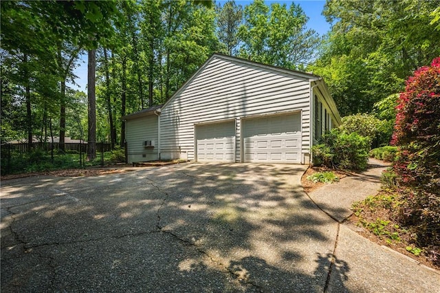 1229 Colony Cir, Marietta, GA 30068 - garage featuring asphalt driveway