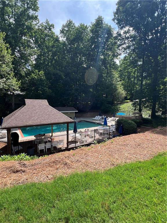 1229 Colony Cir, Marietta, GA 30068 - view of swimming pool with a patio