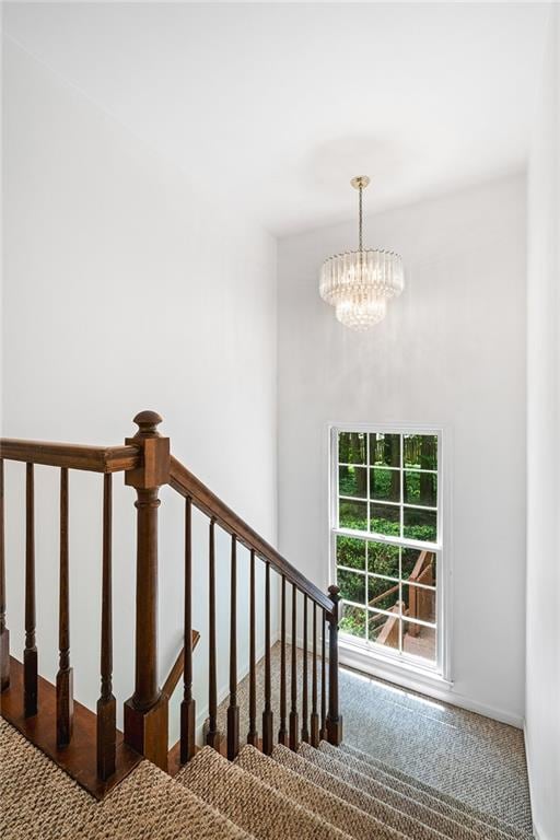 1229 Colony Cir, Marietta, GA 30068 - staircase featuring carpet and a chandelier