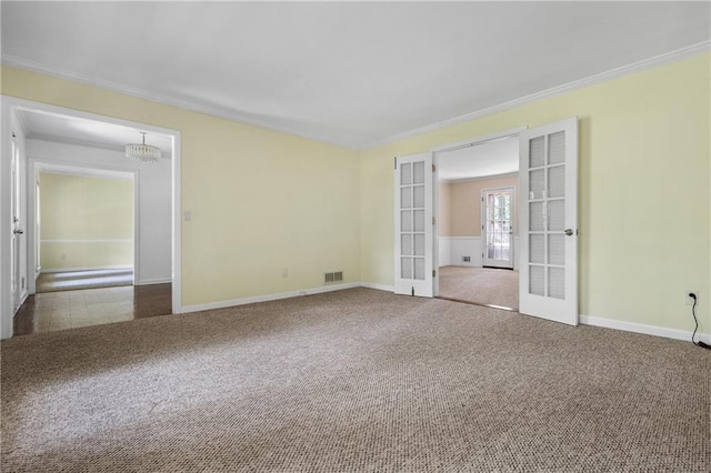 1229 Colony Cir, Marietta, GA 30068 - unfurnished room with french doors, ornamental molding, carpet flooring, and a chandelier