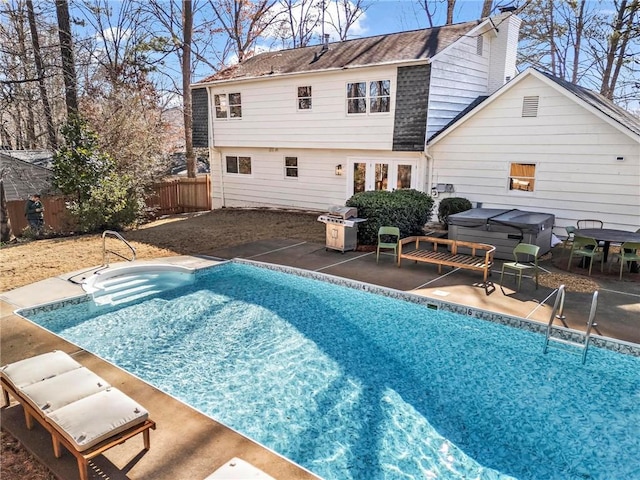 back of property with a patio area