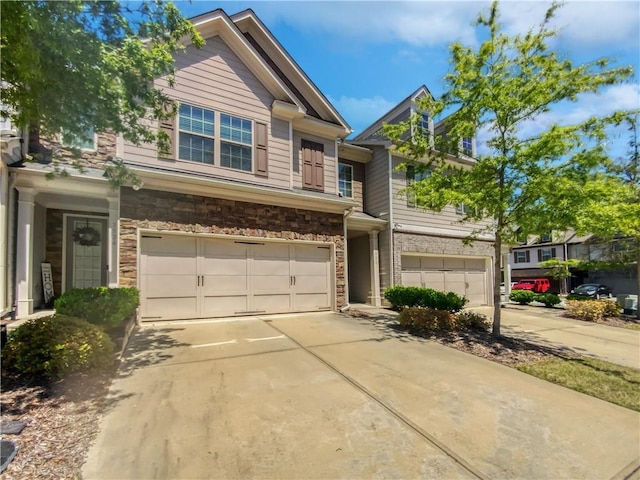 view of front of property with a garage