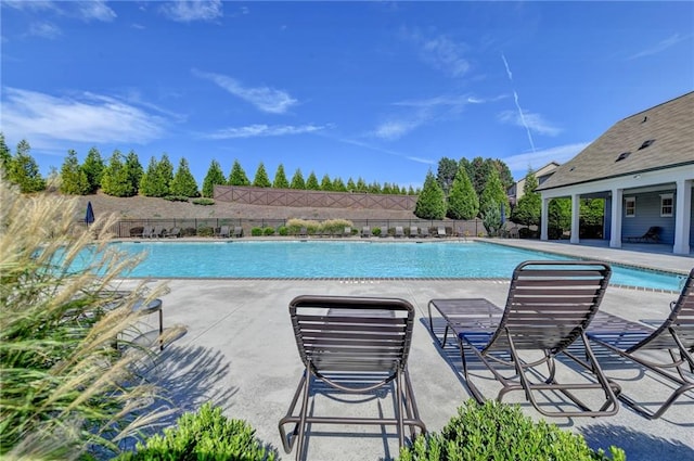 view of pool featuring a patio