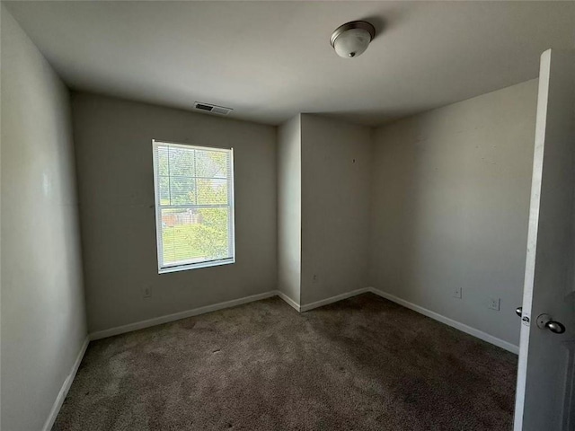 6446 Grey Fox Way, Riverdale, GA 30296 - spare room with carpet floors and baseboards
