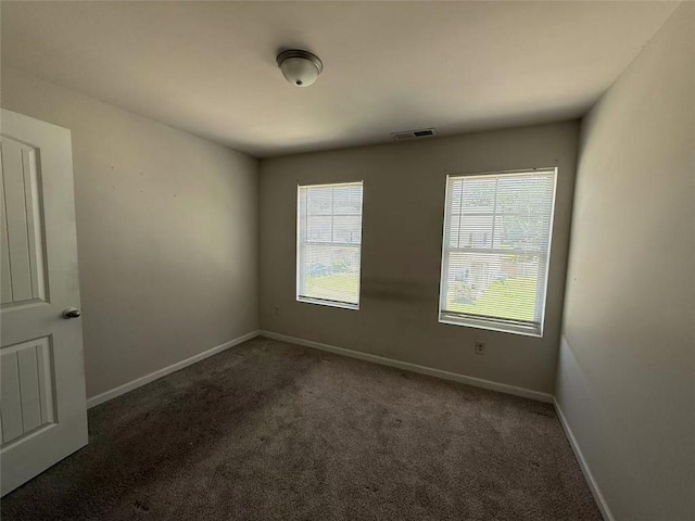 6446 Grey Fox Way, Riverdale, GA 30296 - spare room with carpet and baseboards